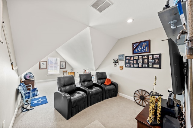 cinema featuring carpet, visible vents, vaulted ceiling, and baseboards