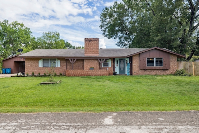 ranch-style house with a front yard