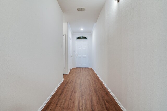 hall featuring wood-type flooring