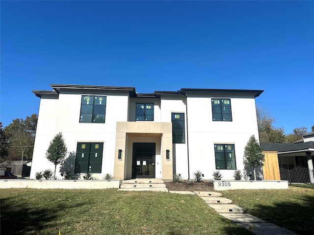 view of front of house featuring a front lawn