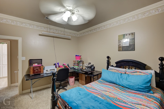 bedroom featuring ornamental molding, light colored carpet, and ceiling fan