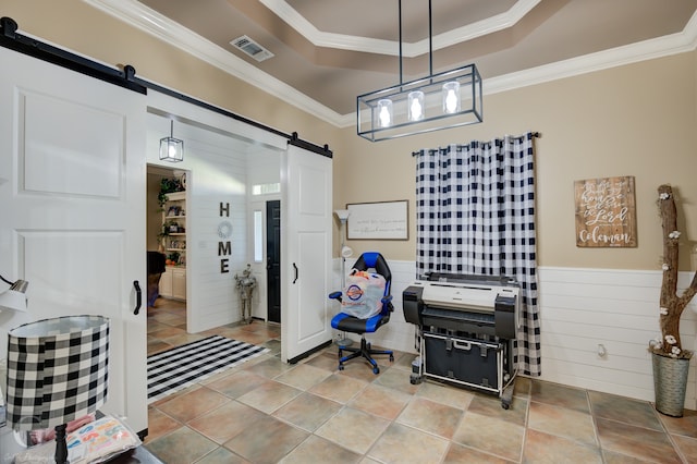 interior space with a barn door, ornamental molding, and light tile patterned floors