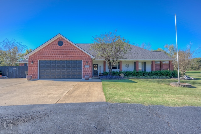 ranch-style house with a front lawn and a garage