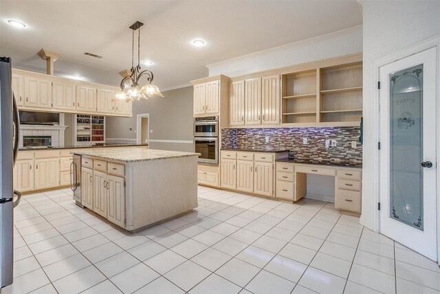 living room with built in shelves, light hardwood / wood-style flooring, ceiling fan, and crown molding