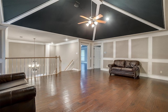 interior space featuring ceiling fan with notable chandelier, wood-type flooring, crown molding, and high vaulted ceiling