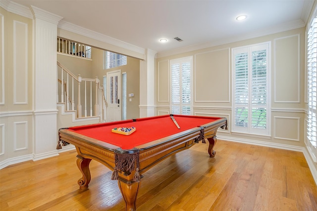 recreation room featuring crown molding, hardwood / wood-style floors, and pool table