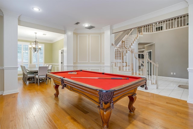 rec room featuring wood-type flooring, ornamental molding, billiards, and a chandelier