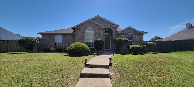 view of front property with a front yard