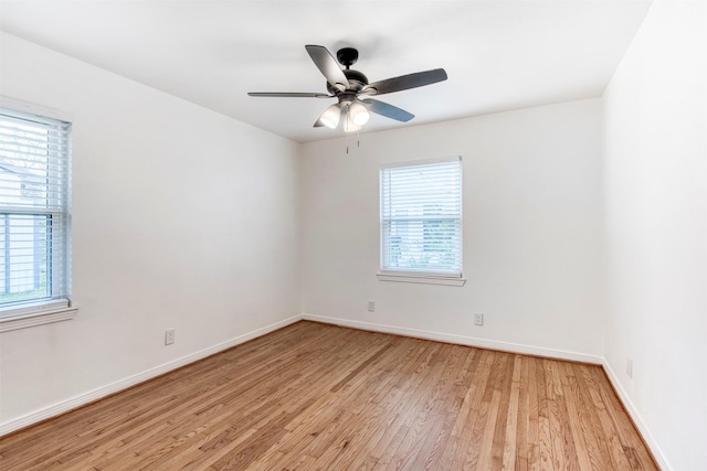 unfurnished room featuring light hardwood / wood-style floors and ceiling fan