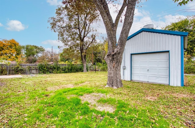 garage with a yard