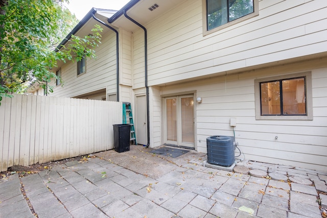 exterior space featuring cooling unit and a patio area