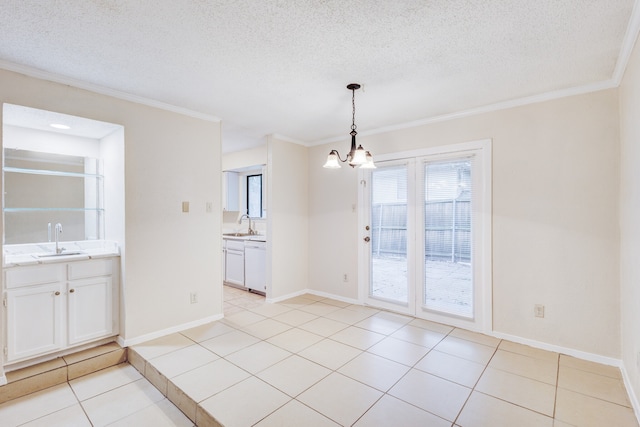 unfurnished dining area featuring light tile patterned floors, sink, and a chandelier