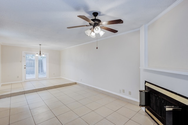 unfurnished living room with a textured ceiling, light tile patterned floors, ceiling fan with notable chandelier, and ornamental molding