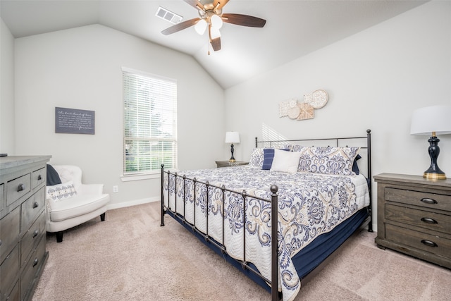 bedroom featuring light colored carpet, ceiling fan, and lofted ceiling