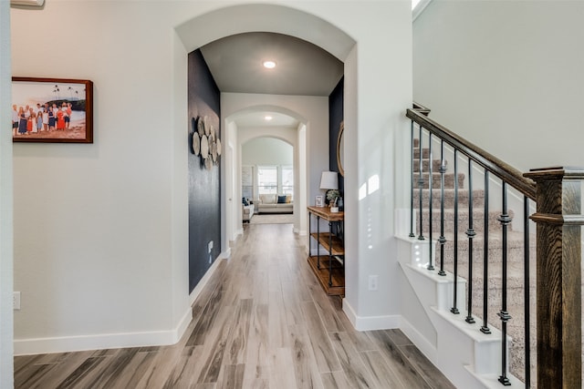 corridor featuring light hardwood / wood-style flooring