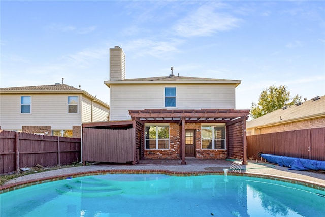 view of pool featuring a pergola