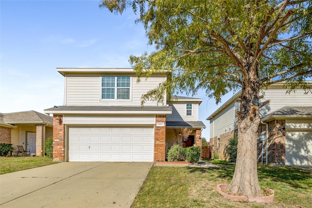 front of property with a garage and a front lawn