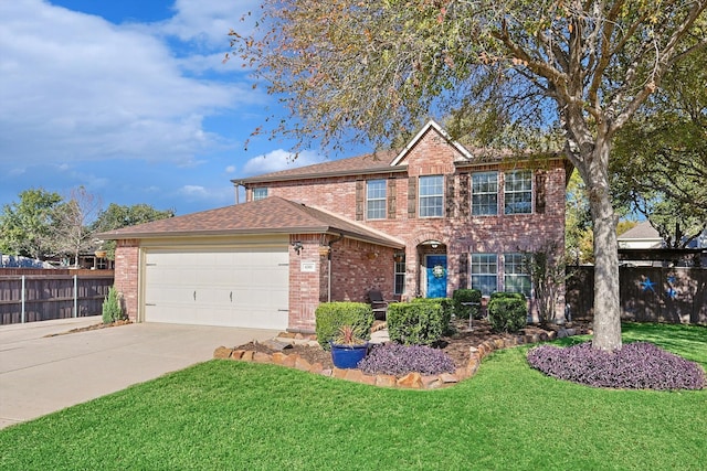 view of front of property featuring a garage and a front lawn