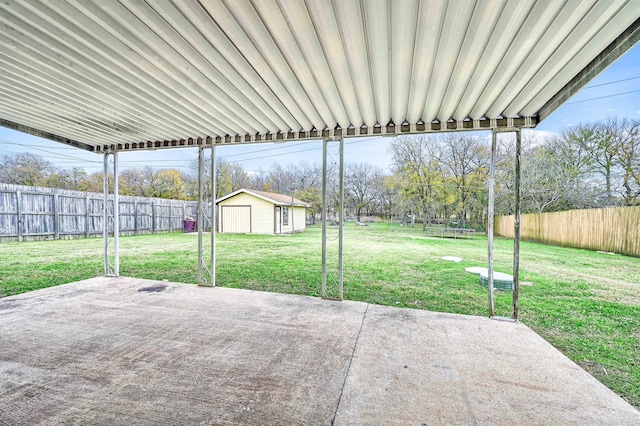 view of patio / terrace with an outbuilding