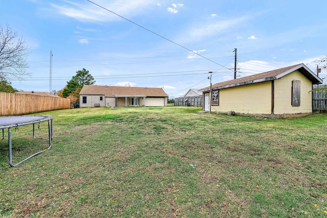 view of yard featuring a trampoline