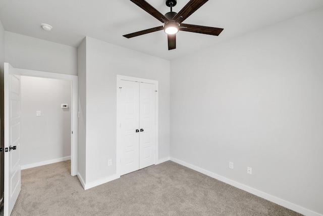 4016-4018 Clovis St, Midlothian, TX 76065 - unfurnished bedroom featuring light colored carpet, a closet, baseboards, and ceiling fan