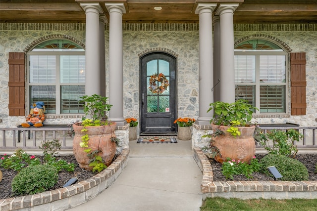 entrance to property with covered porch