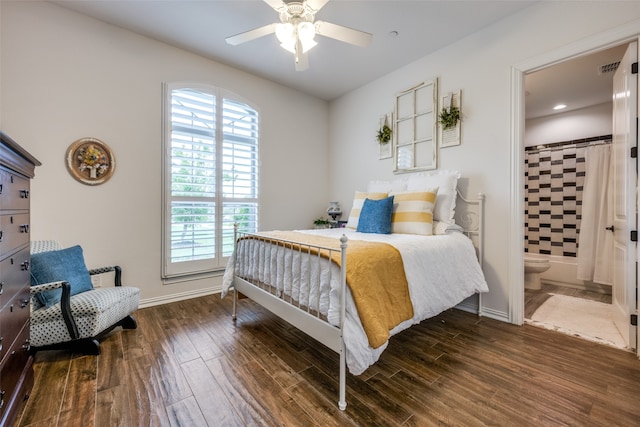 bedroom with connected bathroom, ceiling fan, and dark wood-type flooring