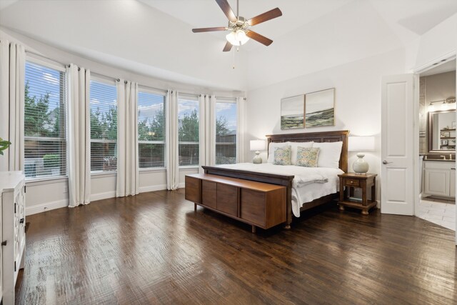 dining area with dark wood-type flooring and a chandelier