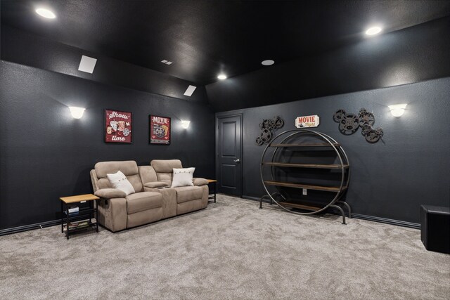 playroom with ceiling fan, lofted ceiling, and light hardwood / wood-style flooring