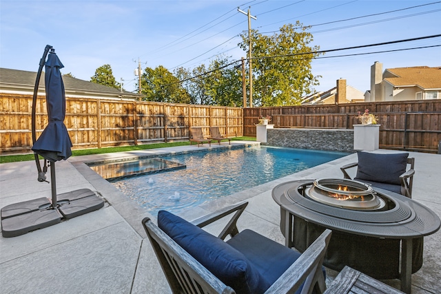 view of swimming pool with a patio area