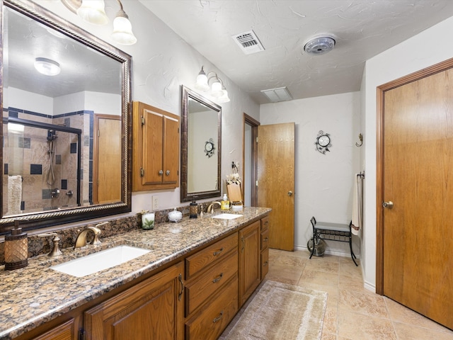 bathroom with vanity and walk in shower