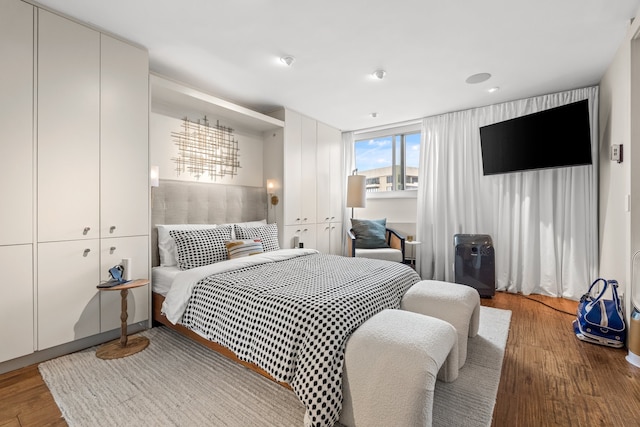 bedroom featuring hardwood / wood-style flooring