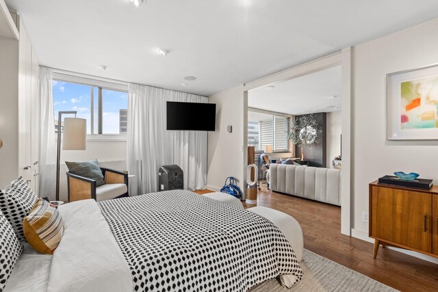 bedroom featuring wood-type flooring