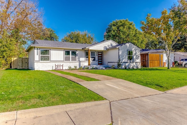 view of front of home with a front lawn