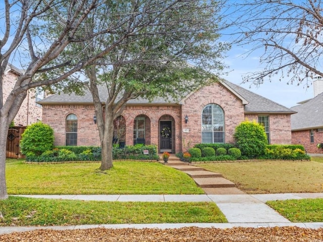 view of front of house with a front lawn