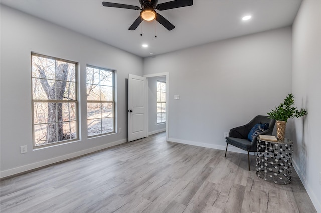 unfurnished room featuring light wood-type flooring, ceiling fan, baseboards, and recessed lighting