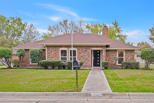 single story home featuring a front yard