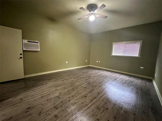 unfurnished room featuring ceiling fan, a wall mounted air conditioner, and dark hardwood / wood-style floors