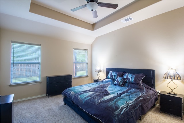 bedroom featuring ceiling fan and light carpet