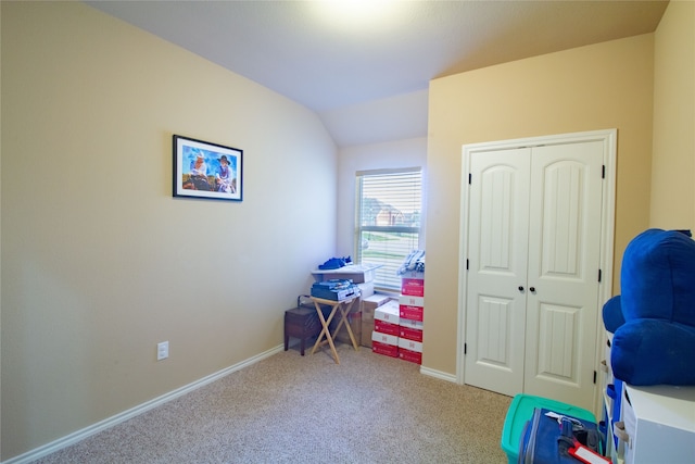 playroom with light carpet and lofted ceiling