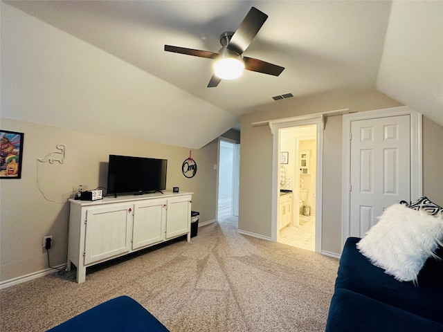 living room with light carpet, ceiling fan, and lofted ceiling