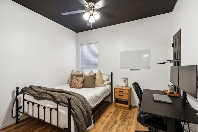 bedroom featuring ceiling fan and wood-type flooring