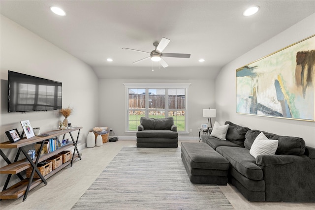 living room featuring lofted ceiling and ceiling fan