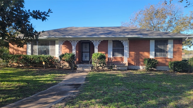 ranch-style house with a front yard