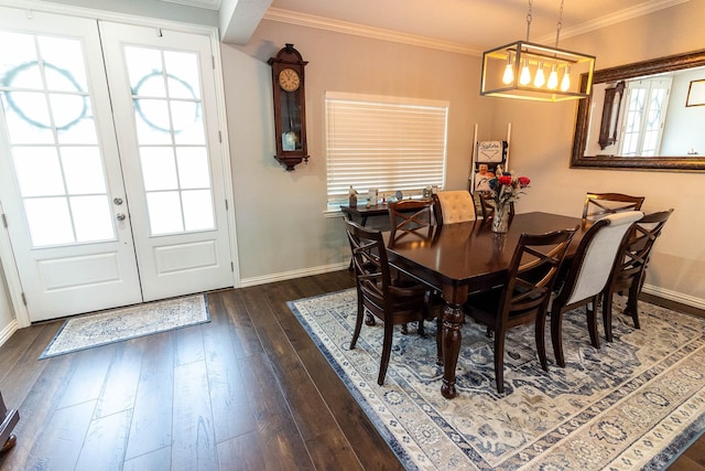 dining space featuring dark wood-style floors, french doors, baseboards, and crown molding