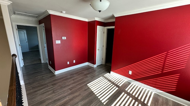 unfurnished room with dark hardwood / wood-style floors and ornamental molding