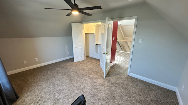 bonus room with carpet, ceiling fan, and lofted ceiling