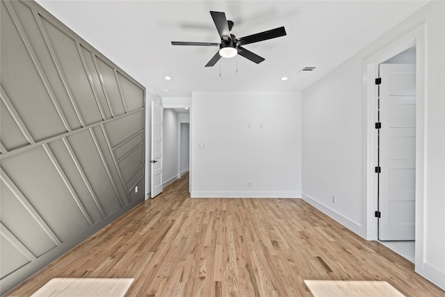 unfurnished bedroom with light hardwood / wood-style flooring and ceiling fan