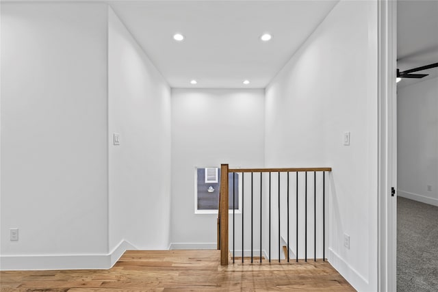 hall featuring wood-type flooring