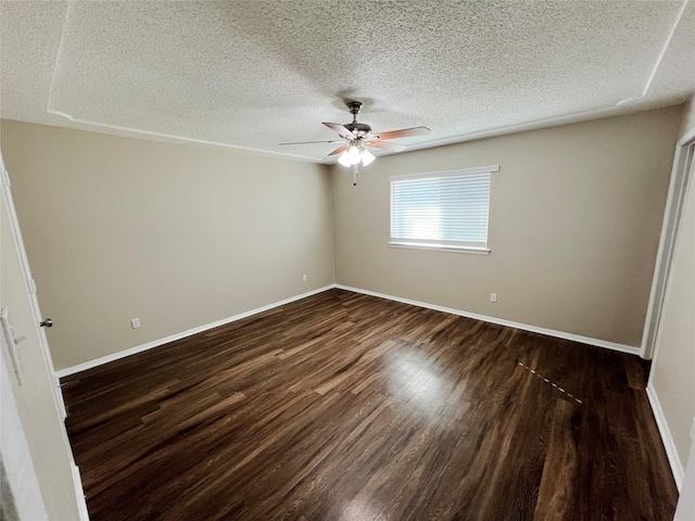 unfurnished bedroom with a textured ceiling, ceiling fan, and dark wood-type flooring